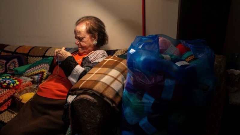 Greek Grandmother Makes Scarves for Children in Need