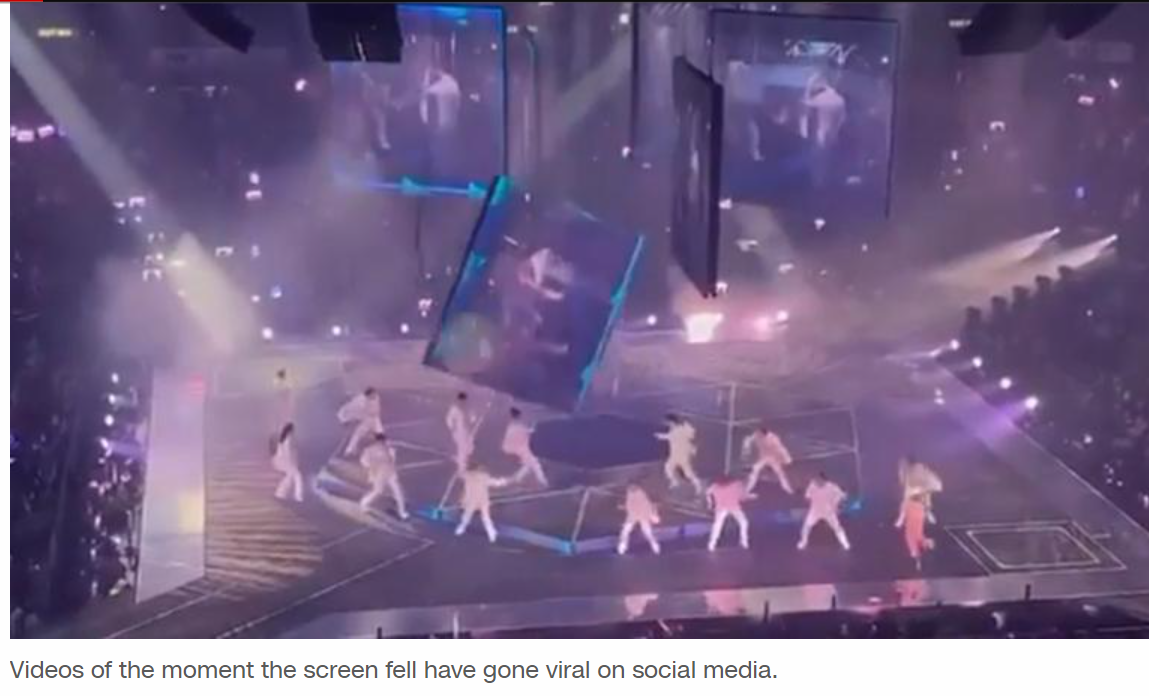 Giant screen hits dancers for boy band Mirror during Hong Kong concert