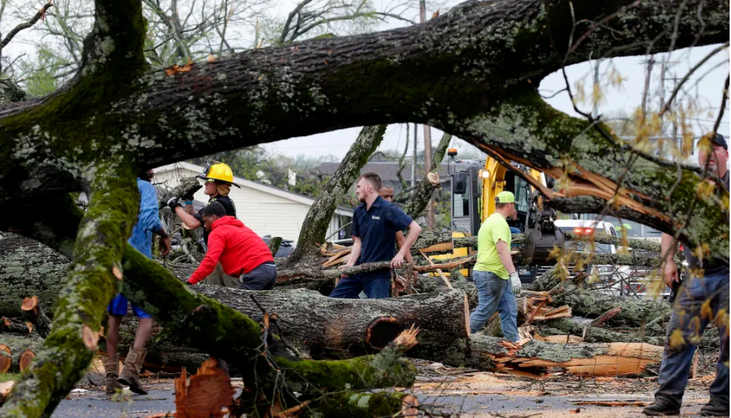 At least 5 killed and dozens others are hospitalized as tornadoes and dangerous storms tear through the South and Midwest