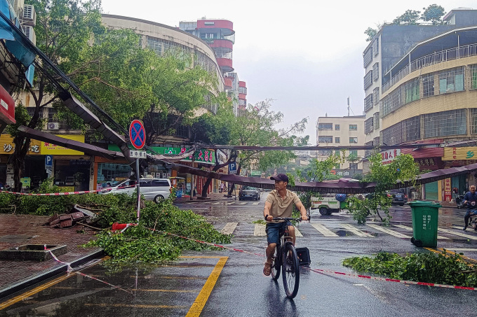 Three dead, tens of thousands evacuated as storms strike south China