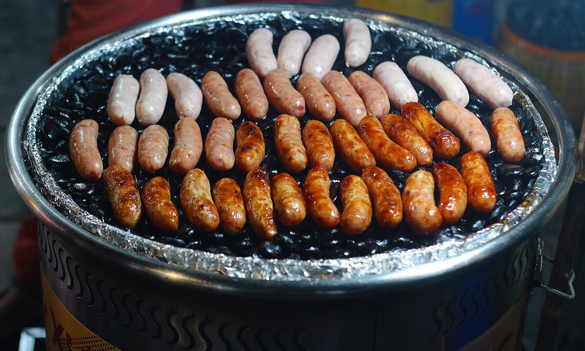 Hot on the streets: Hanoi's stone-grilled sausage trend