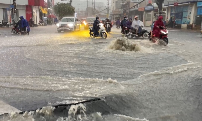 HCMC sewers, road damaged after torrential rain despite $9M anti-flooding project