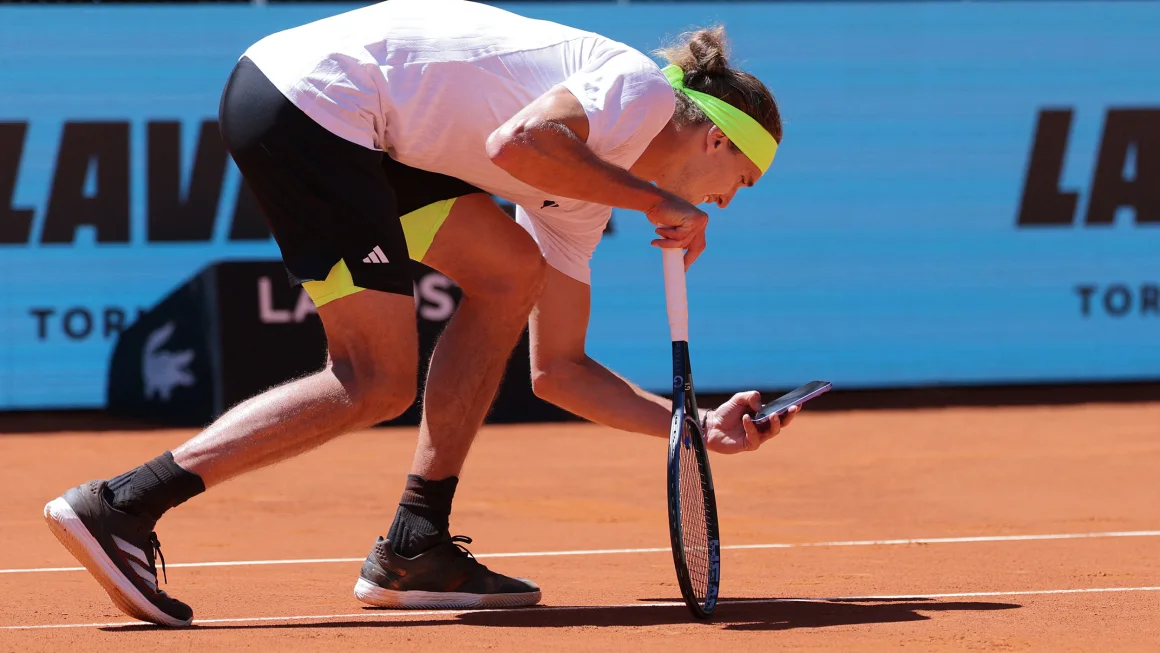 Alex Zverev given warning after using phone to take photo of disputed ball mark in Madrid Open victory