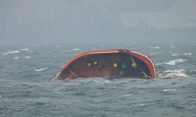 Philippines races to contain spill after oil tanker capsizes off Manila