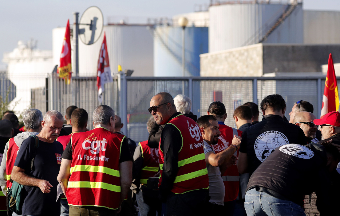 France tries to break oil refinery strike as drivers line up for gas