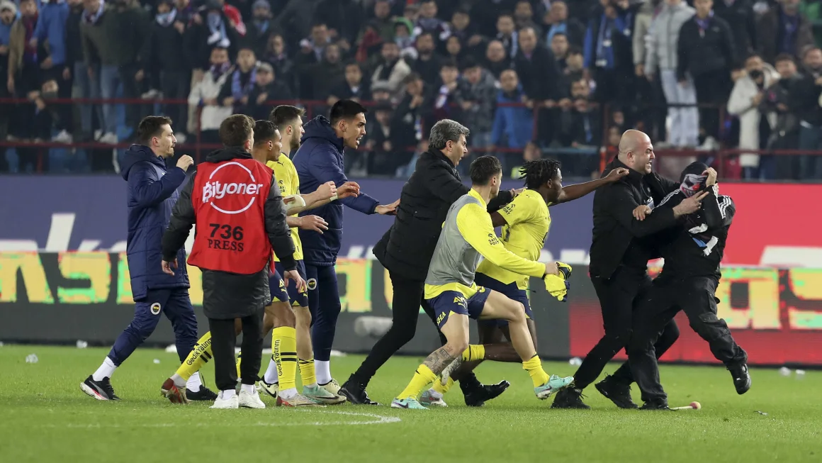 FIFA condemns Turkish league violence after soccer fans storm pitch and attack Fenerbahçe players