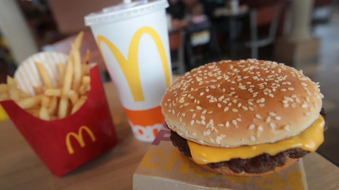 McDonald's president says its food is safe to eat after E. col...